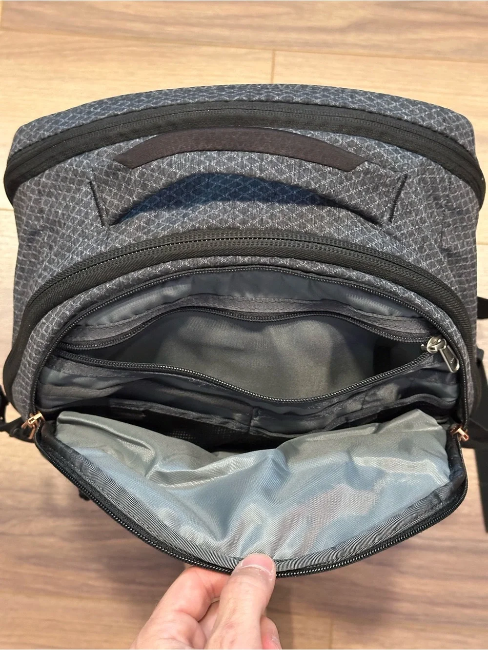 The North Face Surge Backpack in TNF Black Heather Copper/TNF Black